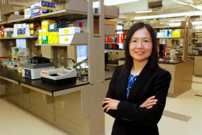 Prof. Xue-Jun LI poses in medical lab