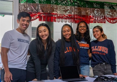 Second-year medical students Nicholas Nguyen (Co-Director of Avicenna Lifestyle) and Claire Lee (Co-Director of Avicenna Lifestyle), senior Haihley Connors (Co-Director of Avicenna Outreach), second-year medical student Anisha Mittal (Co-Director of Avicenna Outreach) and sophomore Isela Villaseñor (Avicenna Interpretations volunteer) from the Lifestyle, Outreach, and Interpretations team volunteer at the Campana de Salud Health Fair, promoting Avicenna, educating about healthy nutrition, and offering blood pressure screenings.