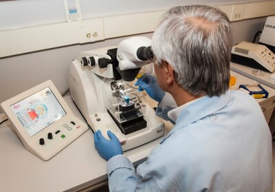 scientist using research equipment