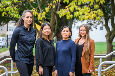 four female researchers outdoors