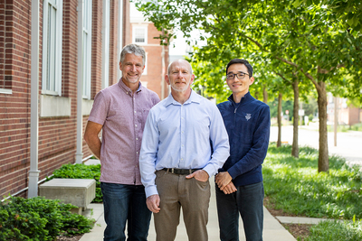 Research team members outside on campus