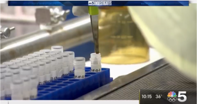 wastewater samples in test tubes in lab