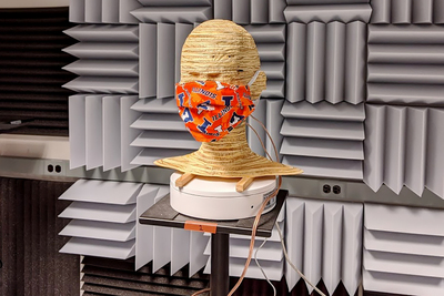 Dummy head with mask in lab