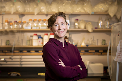 Kathryn Clancy posing in lab