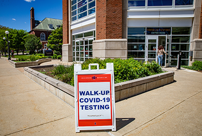SHIELD testing sign in front of building